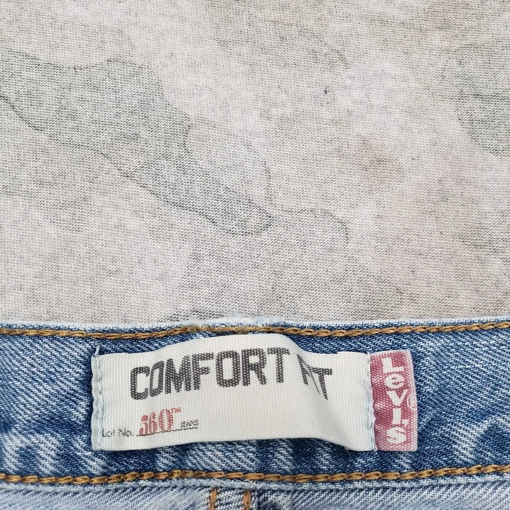 VTG Levi's 560 Jeans Mens 34x34 Blue Y2K Comfort Fit Denim Light Wash Distressed